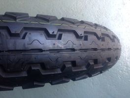 4.25/85 x 18 Dunlop Tyre TT100 K81
