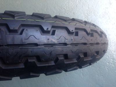 4.25/85 x 18 Dunlop Tyre TT100 K81
